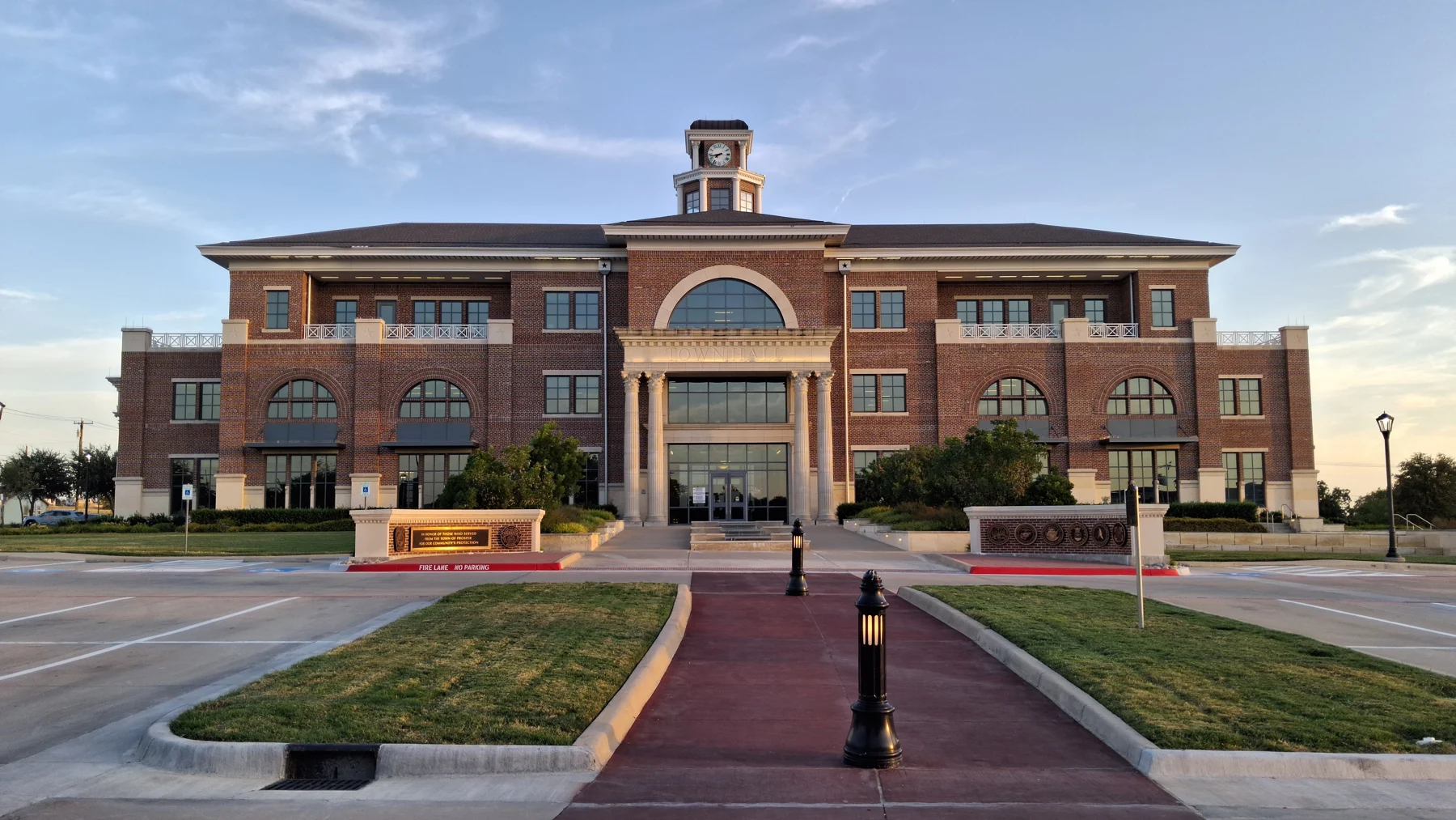 Prosper Town Hall at dusk, photographed in August 2026